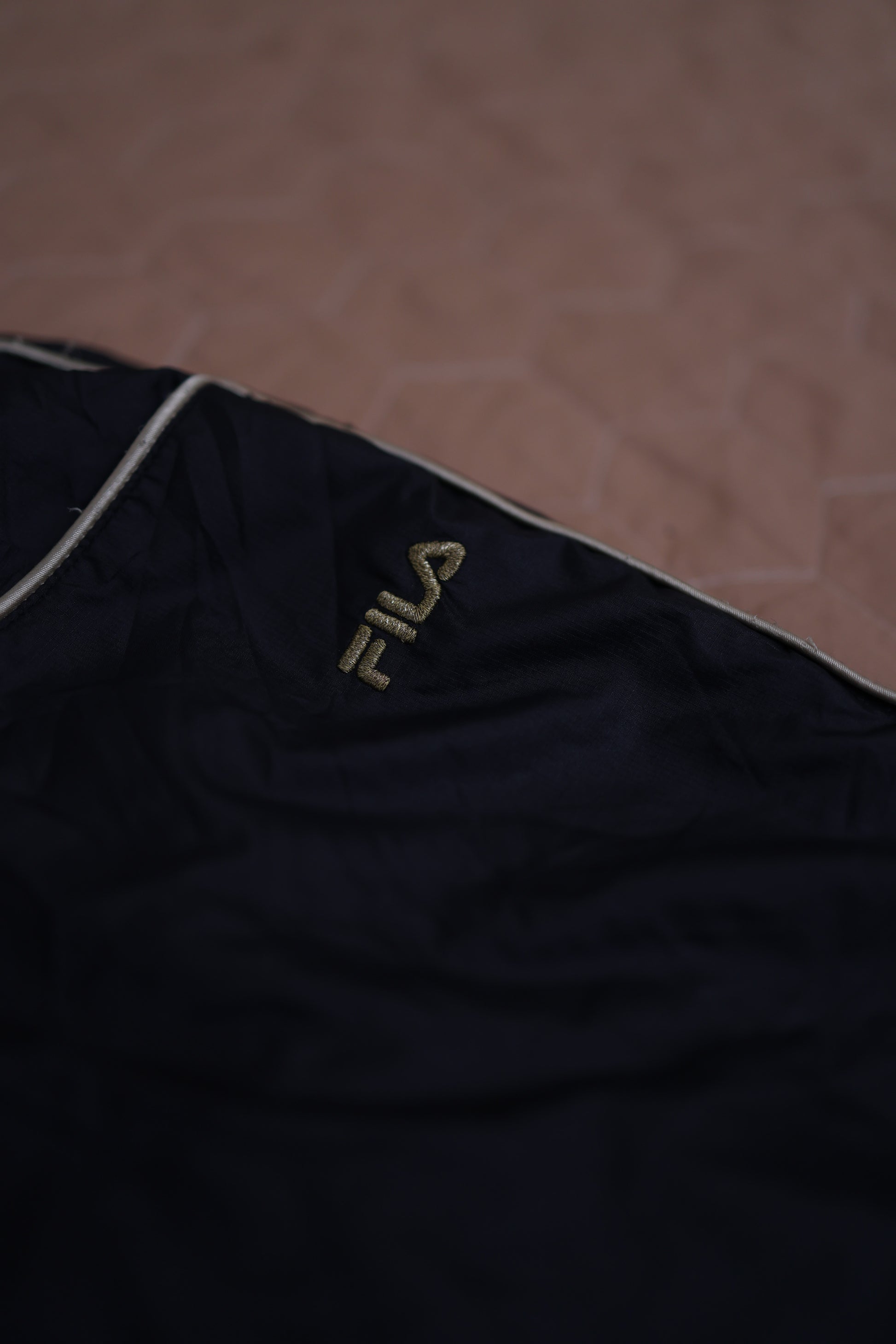 Vintage FILA Black Track Pants with White Piping